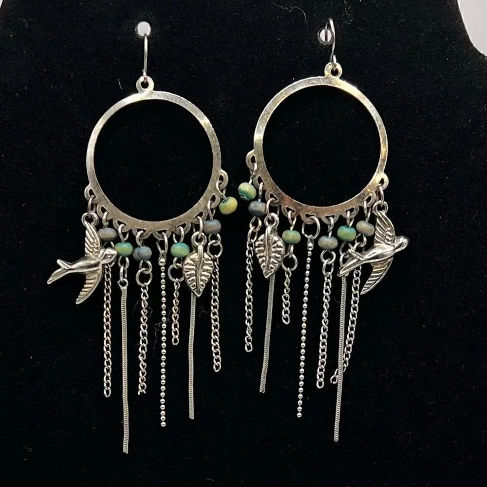 *3/$20* Detailed silver tone hoop earrings with bird leaf and bead accents
